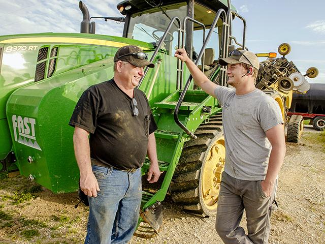 Scott Wallis (left) worries ag&#039;s high capital requirements will be a tough hurdle for his son, JR, to overcome. (Mary Ann Carter)