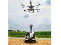 Travis Couch outfitted his pickup truck with water and chemical tanks, as well as a generator to charge drone batteries. (Joel Reichenberger)