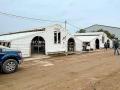 For generations, two identical wood buildings housed hog and sheep projects during the 107-year run of the eastern Nebraska fair. A new livestock building will replace these old buildings in 2027. (Russ Quinn)