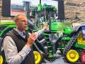 John Deere Senior Vice President and Chief Technology Officer Jahmy Hindman points out the features on one of the company&#039;s tractors that&#039;s equipped for autonomous tillage. (DTN/Progressive Farmer photo by Joel Reichenberger)