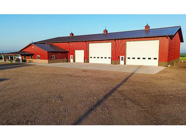 This 81- x 150-foot shop building is designed for traffic flow, an efficient maintenance pipeline and livestock auctions. (Dan Miller)