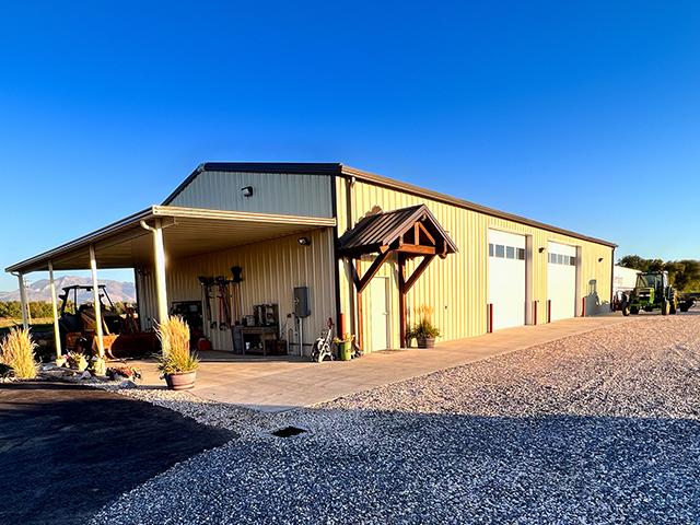 Tom and Tina Favero built a 4,000-square-foot shop outside of Ogden, Utah. They dressed it up with a timber frame entryway. (Dan Miller)