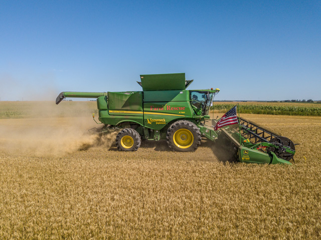 Titan International&#039;s Flags Over Harvest promotion gives farmers American Flags to fly at harvest and pledges a $5 donation for each flag requested to Farm Rescue. (Photo courtesy of Titan International)