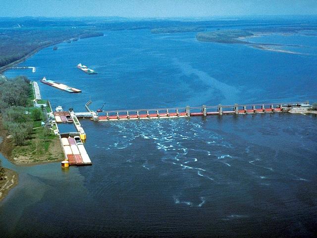 Lock and Dam 25 is a 1,296-foot-long dam structure with three submersible roller gates and 14 submersible tainter gates. At the time of construction, the submersible gates represented a marked advance in gate design and were seen as an improvement over non-submersible gates because they allowed for the almost unobstructed flow of floodwaters, ice and debris, according to USACE. However, having opened on May 18, 1939, Lock and Dam 25 is well beyond its 50-year design life. (Photo courtesy of USACE)