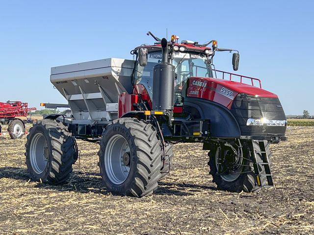 Canadian grain farmer Brady Fahlman tells of his 2,000-acre test run earlier this year with the new Case IH and Raven Trident 5550, the industry&#039;s first autonomous spreader. The Trident 5550 will be available on a limited basis in 2023. (DTN/Progressive Farmer photo by Dan Miller)