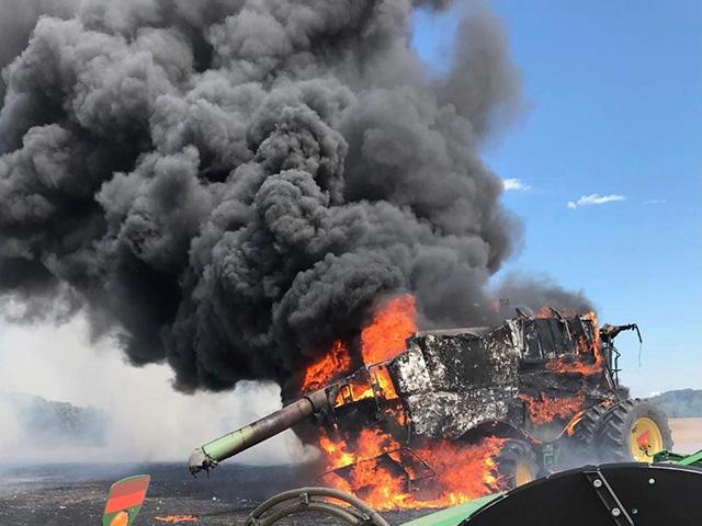 Warm, dry, windy harvest conditions combined with crop dust and chaff accumulating on hot surfaces can increase the risk of combine and other machinery fires. (File photo courtesy of Kindred, North Dakota, Fire Department)