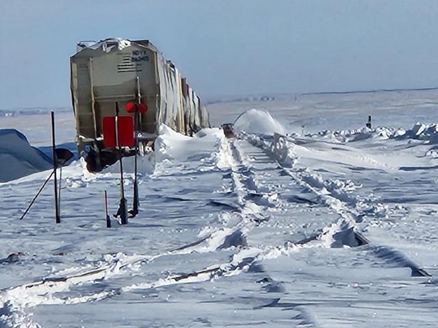 Tim Luken of Onida, South Dakota, sent this picture in Friday, April 7, after finally reaching the elevator after two days of relentless snow and wind. He said the goal for the day was to get the rail cars unstuck and clear the snow. (Photo courtesy Tim Luken)