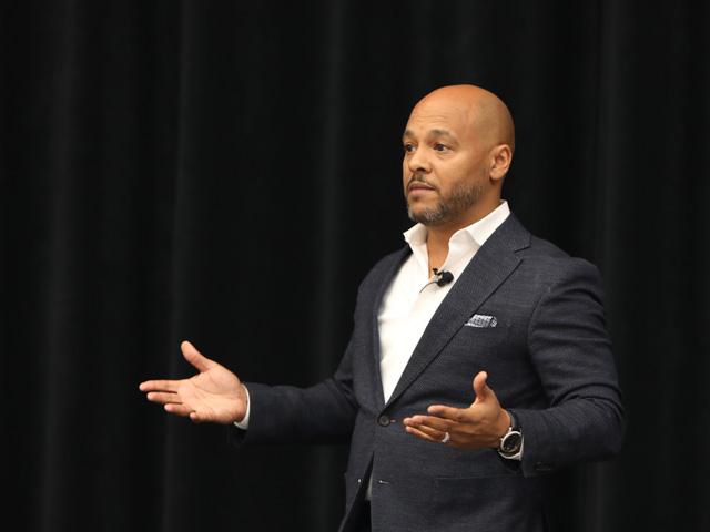 Cameron Bruett, head of corporate affairs for JBS USA, speaks during the Iowa Cattle Industry Leadership Summit in Altoona on Dec. 14. (Photo courtesy of the Iowa Cattlemen&#039;s Association)