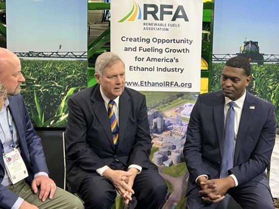 Agriculture Secretary Tom Vilsack, center, talks with Geoff Cooper, president and CEO of the Renewable Fuels Association, left, and EPA Administrator Michael Regan on Friday at the Commodity Classic expo in Houston. Cooper and others sat down with administration officials to talk about the guidance delay for Sustainable Aviation Fuel tax credits. (DTN photo by Chris Clayton) 