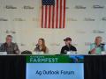 At Farmfest in Minnesota, Frayne Olson, left, a crops economist at North Dakota State University Extension, talks about pressures facing farmers to finance their operations this year and challenges they could face with next year's crop. Also on the panel were Faith Parum from the American Farm Bureau Federation, Brian Werner, executive director of Minnesota Biofuels, and Mark Schultz, a market analyst with North Star Commodities. (DTN photo by Chris Clayton) 