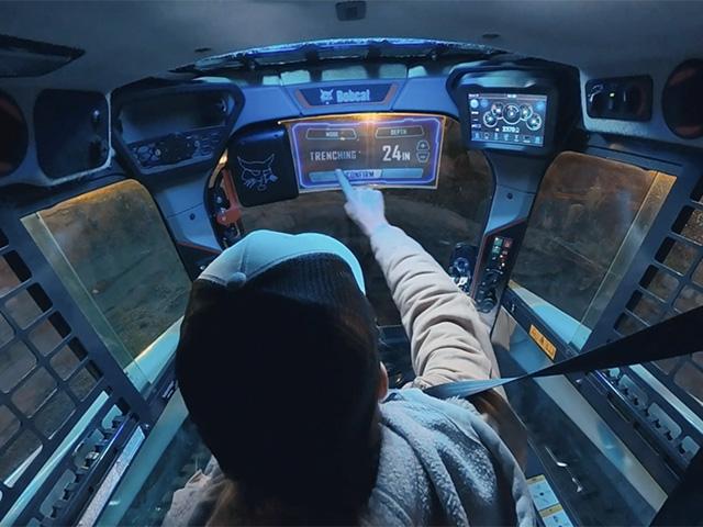 Bobcat's Advanced Display Technology is a micro-LED, transparent, auto-tint, touch-enabled display concept integrated into the cab door or machine window. The system overlays operational data directly onto the operator's field of view. (Photo courtesy of Bobcat)