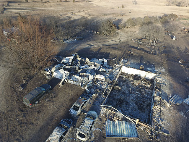 Only rubble remained from the Rathbun home after Jim Rathbun escaped seconds before the Four County Fire swept over the property Dec. 15. (Photo by Larry Reichenberger)