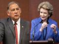 Sen. John Boozman, R-Ark., ranking member of the Senate Agriculture Committee, and Sen. Debbie Stabenow, D-Mich., the chairwoman of the committee, speaking to reporters Tuesday about the debt debate and the farm bill. (DTN/The Progressive Farmer photos by Joel Reichenberger) 