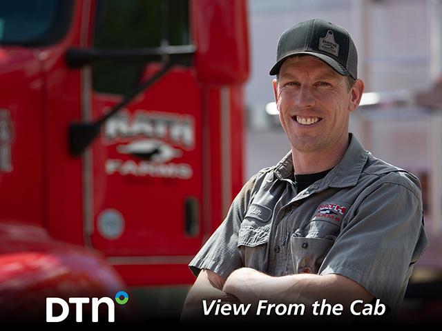 Doing pre-trip inspections to check things like semi-tires are important on Rath Farms, of Belgrade, Minnesota, especially as harvest looms, said Tyler Rath. (DTN photo by Joel Reichenberger)