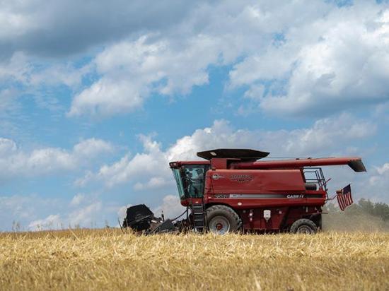 An American flag follows Chris Weaver as he harvests barley. The Finksburg, Maryland, farmer is participating in DTN's View From the Cab series. (DTN photo by Joel Reichenberger)