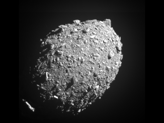The asteroid Dimorphos, as seen from the spacecraft that crashed into it 11 seconds later in NASA's trial run to save the earth from asteroids. (NASA/John Hopkins APL photo)