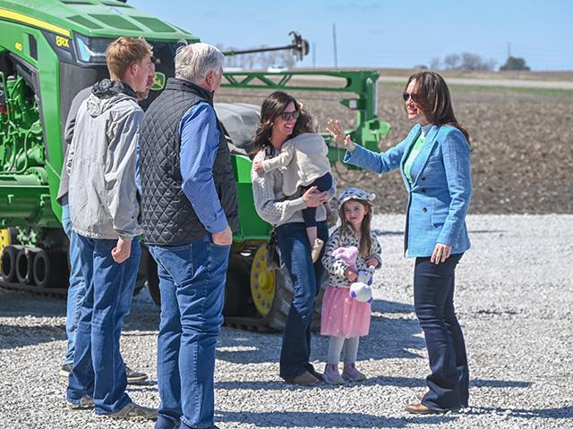 U.S. Agriculture Secretary Brooke Rollins, right, talks with several members of the Manning family at a stop on their crop and hog farm near Waukee, Iowa, on Monday. (DTN/Progressive Farmer photo by Jennifer Carrico)