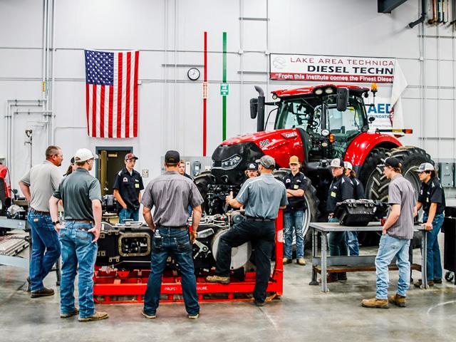 Titan Machinery, with more than 90 Case IH and New Holland ag and construction locations in the U.S. and Europe, last summer held its first Diesel Camp. At four Midwest colleges, 114 ninth- and 10th-graders were immersed in diesel mechanics. (Photo courtesy Titan Machinery)