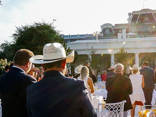Cattlemen dine with President Trump in the Rose Garden at the White House in June. Trump has proposed lifting foreign beef in May, now exempting Brazilian beef from Section 301 tariffs too. (DTN photo by Jake Zajkowski)