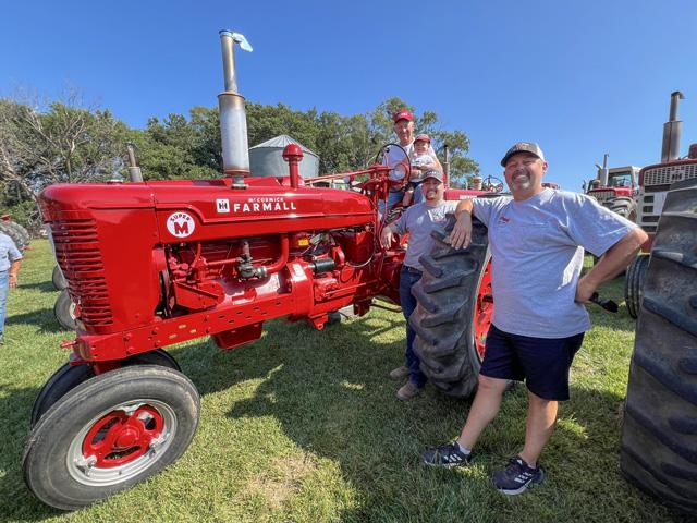 Four generations of the Dreessen family enjoy collecting International tractors. The Kennard, Nebraska, farm family recently displayed all 51 tractors for family and friends for Wayne Dreessen&#039;s 80th birthday. (DTN photo by Russ Quinn)