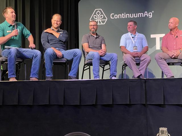 Continuum Ag CEO Mitchell Hora leads a farmer discussion about sustainability with farmers Ryan Oberman, Brandon Hunnicutt, Kevin Reed and Kelly Garrett (left to right), during a topsoil summit in Riverside, Iowa, this week. (DTN photo by Todd Neeley)