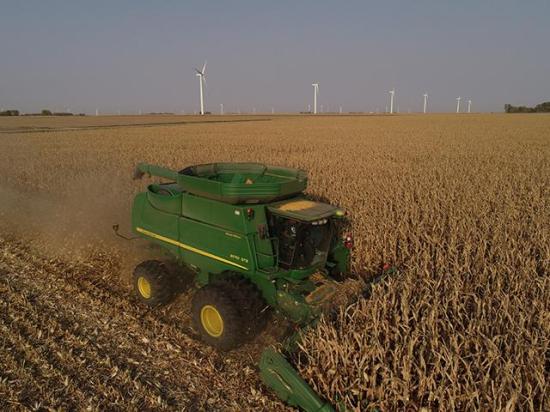 An Iowa farmer harvesting corn. A group of farm leaders on Tuesday sent a letter to congressional leaders warning agriculture could face widespread collapse unless actions are taken to improve the farm economy. (DTN/The Progressive Farmer file photo by Matthew Putney)
