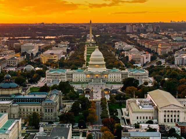 Capitol Hill and the National Mall at sunset. Come Jan. 3, when the 120th Congress begins, both House and Senate chambers will see a 20% turnover from retirements, with a potentially much higher percentage once members see the results of the midterm election. (Getty Images photo by Greggory DiSalvo)