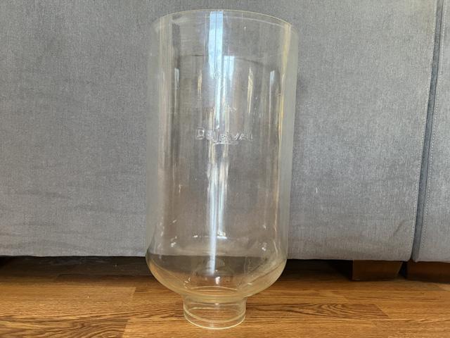 The only thing left of the author's grandparents' milking parlor on their dairy farm: a glass receiving jar. (DTN photo by Russ Quinn)