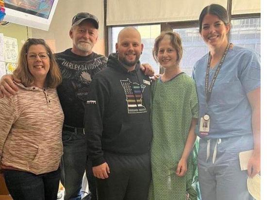 A Minnesota mother of two survived being trampled by a steer and is expected to recover. From left to right, Michele and Don Czanstkowski of Buffalo, Minnesota, next to Jared and Rachel Sands and Dr. Alex Coward of Minnesota. (Photo courtesy of Rachel Sands)