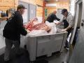 A butcher shop in Iowa wheels beef quarters from the weight room to cold storage for aging. Small processors are now eligible for USDA dollars because of historically tight U.S. cattle supplies. (Photo courtesy of USDA)