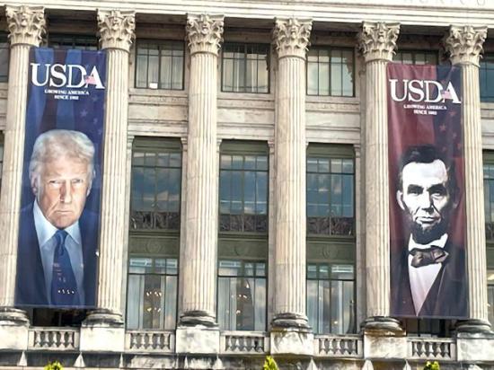 Banners of President Donald Trump and former President Abraham Lincoln were added to the front of USDA&#039;s headquarters building in Washington, D.C., last month. Politico reported Wednesday that USDA delayed the release of a quarterly trade outlook report and removed the analysis from Economic Research Service (ERS) economists because it showed a slightly widening trade deficit for FY 2025. (Photo courtesy of Jerry Hagstrom)