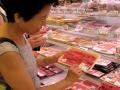 A customer in Japan examines a package of beef from the U.S. On Monday, President Donald Trump announced Japan and South Korea could face 25% tariffs starting Aug. 1 for all imported products. The countries are the No. 5 and No. 6 markets for U.S. agricultural goods. (DTN file photo)