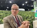 Jim Sutter, CEO of the U.S. Soybean Export Council (USSEC), talks about trade and tariffs on the floor of Commodity Classic in Denver. Sutter said as much as 60% of soybeans, meal and soy oil produced in the U.S. end up exported. Mexico is a top three market for soy products, while Canada is in the top 10 markets for soybeans. (DTN photo by Chris Clayton)
