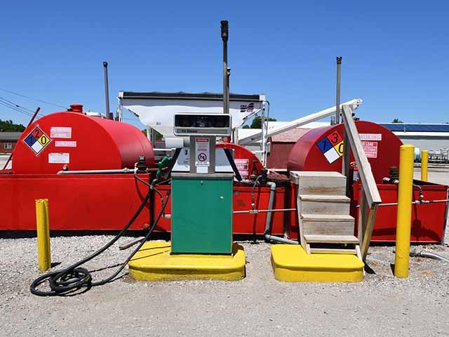 Diesel and gasoline storage tanks sit at a farmer cooperative in Osborn, Missouri. A new executive order from the White House works to temporarily ease certain federal tax and penalty requirements tied to dyed diesel use in highway vehicles. (DTN file photo by Jim Patrico)