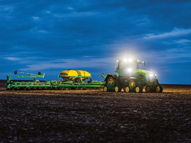 In its final report for fiscal year 2024, Deere &amp; Company reports a net income of $7.100 billion, compared to $10.166 billion last year and an expected $5 to $5.5 billion in 2025. (DTN image courtesy of John Deere)