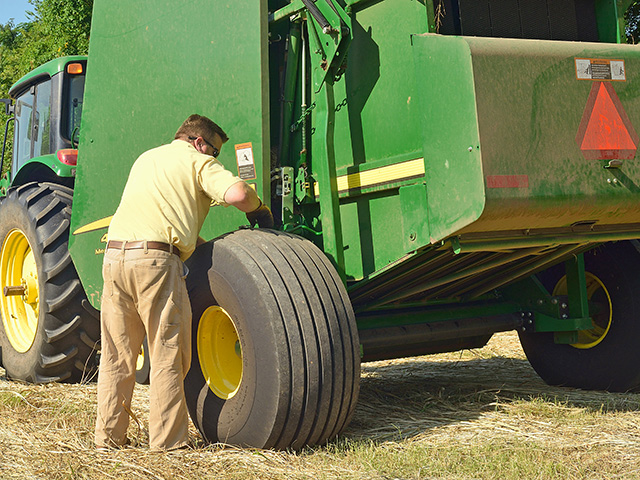 Drought conditions can increase the risk of baler fires, so it makes proper maintenance even more important. (DTN file photo by Jim Patrico)