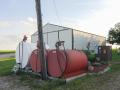 A diesel fuel tank on a farm, where rising fuel costs are adding to farmers' expenses during the 2026 harvest season. (Photo courtesy of Kurt Lawton)