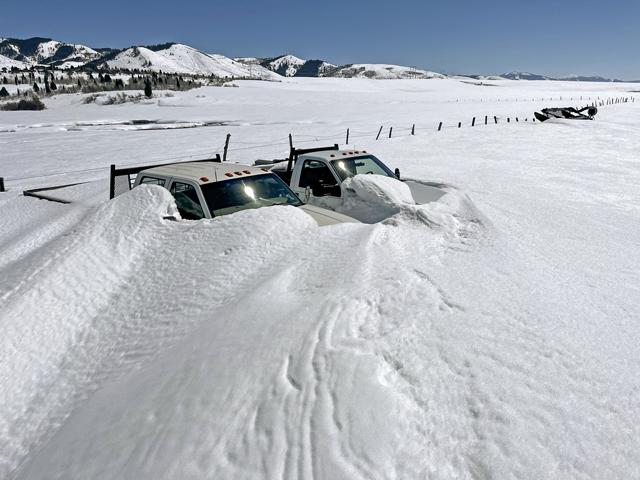 Dan Lakey of Soda Springs, Idaho, was supposed to pick up chemical totes last Friday, but his flatbed pickups were still buried in several feet of snow. (Photo courtesy of Dan Lakey)