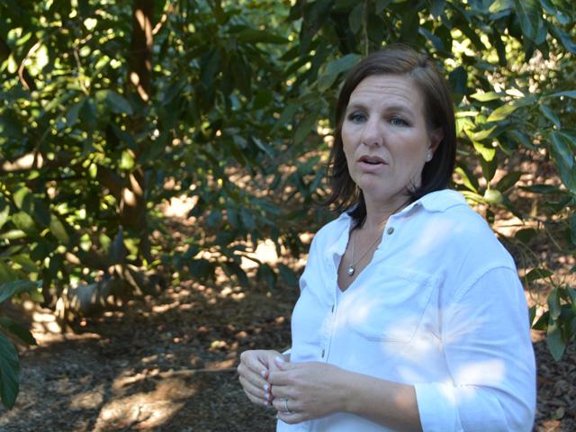 Lisa Tate, who operates a sixth-generation farm in Ventura County, California, is among the farmers speaking out over immigration enforcement that has added more complications to trying to raise year-round orchard crops such as lemons, avocados and coffee. (DTN photo by Chris Clayton)