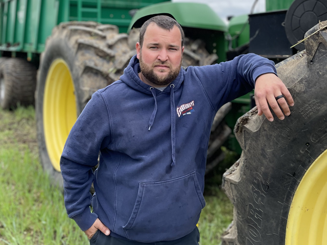 A custom business of spreading chicken litter is just one of the agriculture enterprises Luke Garrabrant operates. (Photo courtesy of Luke Garrabrant)