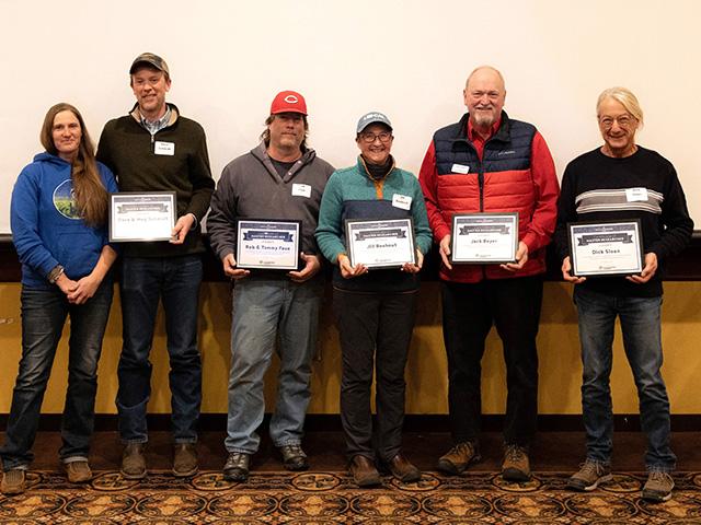 Seven Iowa farmers and members of Practical Farmers of Iowa have been awarded the organization&#039;s highest honor, the Master Researcher Award. From left to right: Meg Schmidt, Dave Schmidt, Rob Faux, Jill Beebout, Jack Boyer and Dick Sloan. Not pictured is Tammy Faux. (Photo courtesy of Practical Farmers of Iowa) 