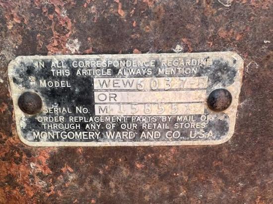 A new purchase on the Quinn farm reveals a Montgomery Ward and Co. running gear on a gravity flow wagon. (DTN photo by Russ Quinn)