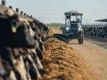 Monarch Tractor CEO Praveen Penmetsa just returned to the U.S. from China and Belgium with thoughts on new U.S. tariffs. He traveled overseas partially to promote Monarch&#039;s newest autonomous tool, its MK-V tractor functioning here as a 24-hour-a-day dairy feed pusher. (Photo courtesy of Monarch Tractor)