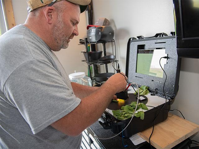 Real-time crop tissue testing helps Chris Weaver get a handle on what nutrients are needed and when. He's been testing the system this year on his Finksburg, Maryland, farm. (DTN photo by Joel Reichenberger)