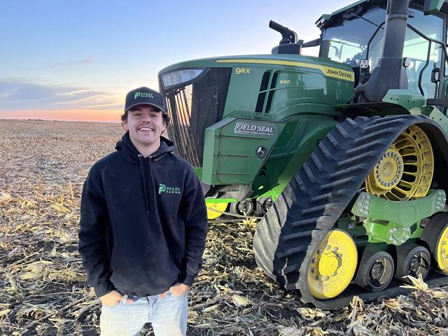Rain makes spring wheat yield, said Nick Pfaff. The Bismark, North Dakota, farmer topped the national dryland spring wheat contest. (Photo by Ashley Pfaff)
