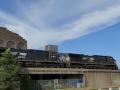 A Norfolk Southern train moves along the Mississippi River through downtown St. Paul, Minnesota. The Norfolk Southern and the Union Pacific railroads are proposing a merger, and disapproval is coming from U.S. rail-served companies. (DTN photo by Mary Kennedy)