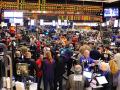 An image of the CME grain trading floor in Chicago in 2014. The old trading floors are gone, but the futures industry is now dealing with pressure from new markets that want physical commodities such as oil to be traded 24 hours a day, seven days a week. Energy and agricultural industries that use futures to hedge risk oppose the idea. (DTN file photo by Jim Patrico)