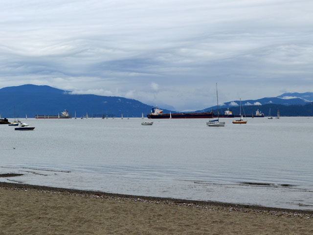 Vessels sit in Burrard Inlet near the Port of Vancouver in British Columbia. All facets of the grain pipeline will be tested in 2013/14. (DTN photo taken by Cliff Jamieson)
