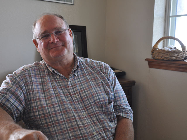 Dale Artho, a farmer outside of Wildorado, Texas, has seen his dryland wheat yields devastated over the last couple of years. A provision in the farm bill would help with that, but Secretary of Agriculture Tom Vilsack said it would not go into effect until 2016. (DTN photo by Chris Clayton)