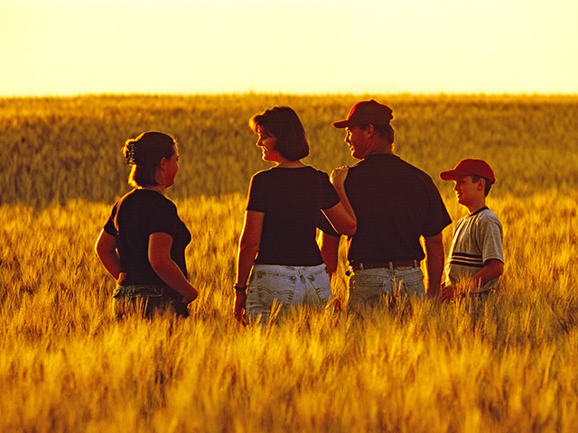The qualities that define success create a paradox for those who prize independence, humility and self-sufficiency. Working together is always important in a family business. (Image by AgStock / Dave Reede)